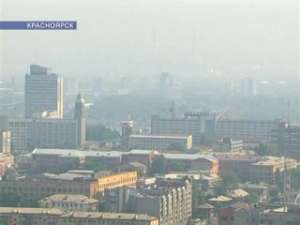 Красноярск заволокло дымом лесных пожаров. Фото: Вести.Ru